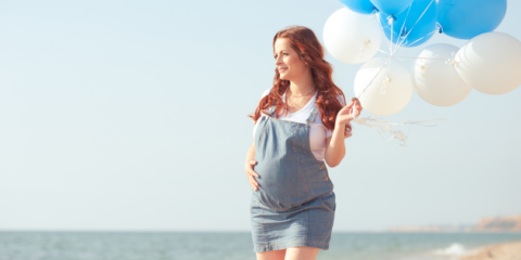 healthy pregnancy - expecting mom at the beach