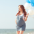 healthy pregnancy - expecting mom at the beach